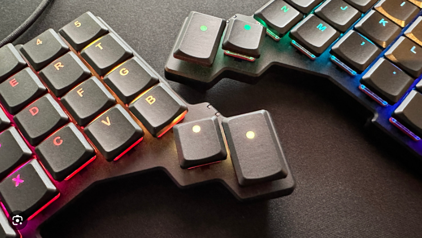ZSA Voyager split keyboard with trackball — designed by Tibbo